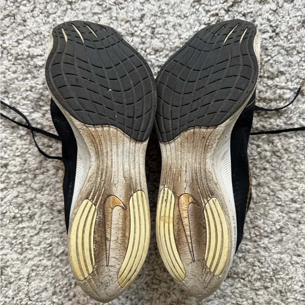 Men's Black and Gold Athletic Marathon Nike ZoomX Vaporfly size 11.5